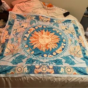 Blue and orange sun tapestry